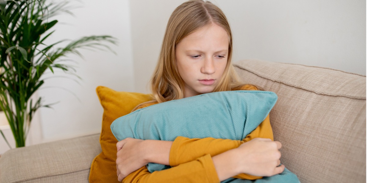 young teen girl experiencing an anxiety attack