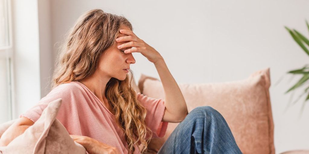 woman being sedentary and feeling depressed