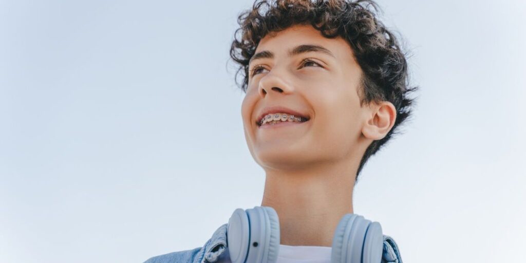 teen looking happy