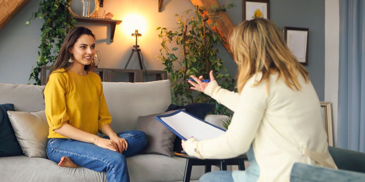 woman talking to a psychiatrist in an office