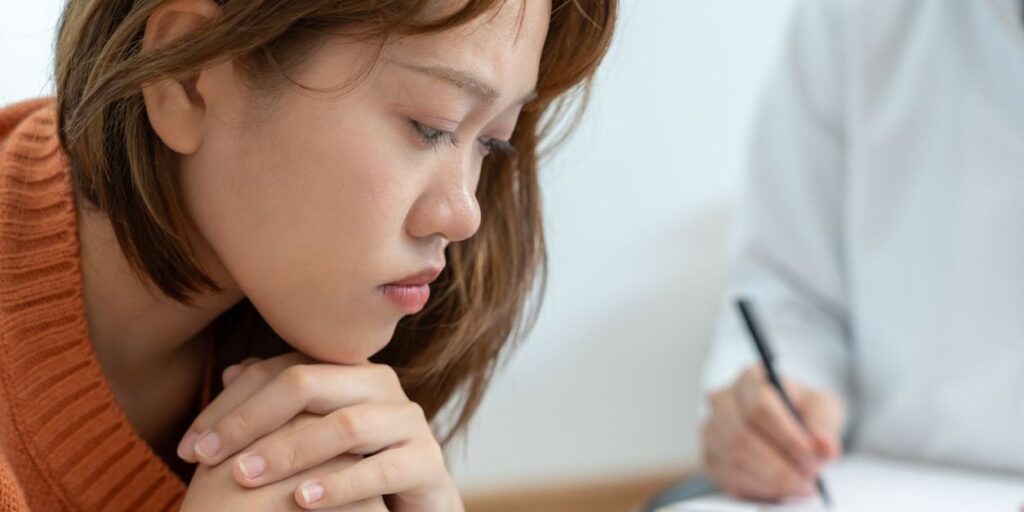 woman with depression with a psychiatrist